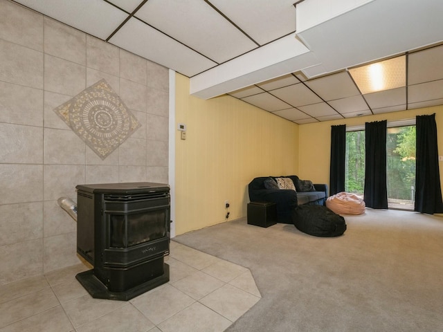 29 Sachson Pl, Wappingers Falls, NY 12590 - sitting room with a drop ceiling, carpet floors, and a wood stove