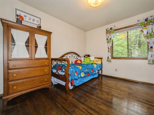 29 Sachson Pl, Wappingers Falls, NY 12590 - bedroom featuring dark wood-type flooring and baseboards