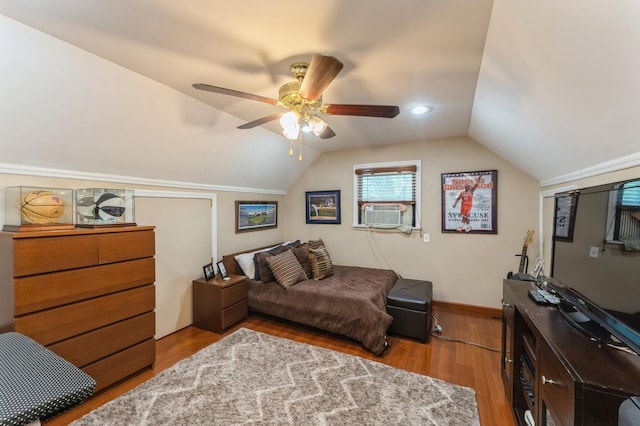 18 Hawthorne Ln, Valley Stream, NY 11581 - bedroom featuring lofted ceiling, wood finished floors, cooling unit, a ceiling fan, and baseboards