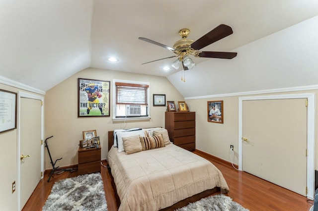 18 Hawthorne Ln, Valley Stream, NY 11581 - bedroom featuring lofted ceiling, wood finished floors, a ceiling fan, cooling unit, and baseboards