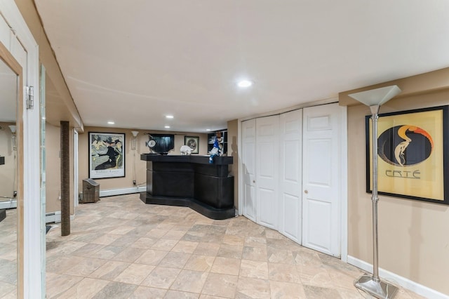 18 Hawthorne Ln, Valley Stream, NY 11581 - bar featuring a baseboard heating unit, recessed lighting, and baseboards
