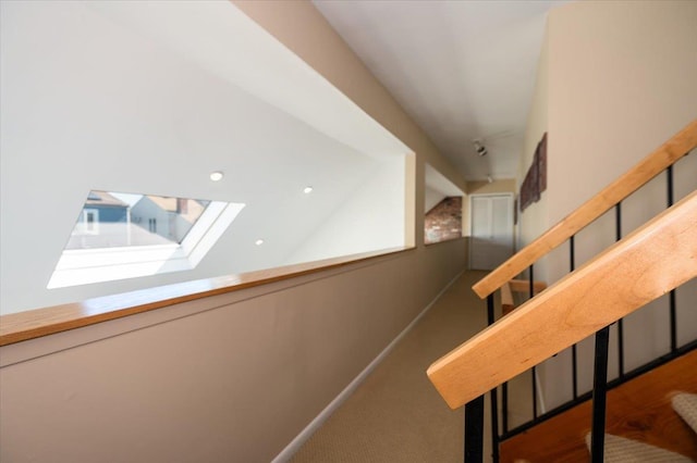 1270 Mara Ct, Atlantic Beach, NY 11509 - stairs with a skylight and vaulted ceiling
