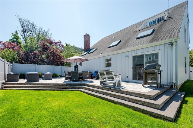 1270 Mara Ct, Atlantic Beach, NY 11509 - rear view of house with a patio, roof with shingles, and a chimney