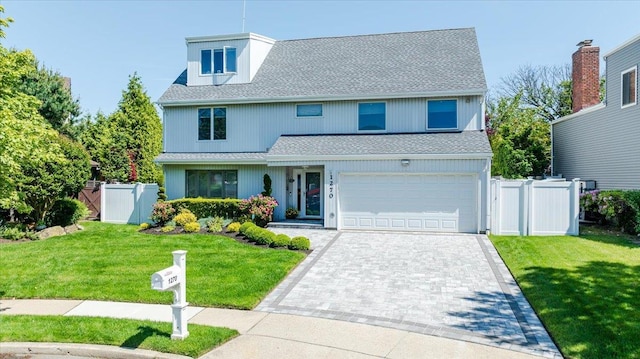 1270 Mara Ct, Atlantic Beach, NY 11509 - view of front of property with a shingled roof, a garage, decorative driveway, and a gate