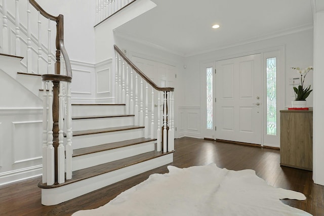 15 Old Farm Rd, Scarsdale, NY 10583 - entryway with a decorative wall, stairway, dark wood finished floors, ornamental molding, and recessed lighting