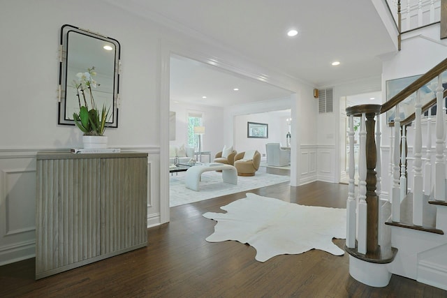 15 Old Farm Rd, Scarsdale, NY 10583 - foyer entrance featuring a decorative wall, crown molding, wood finished floors, a wainscoted wall, and recessed lighting