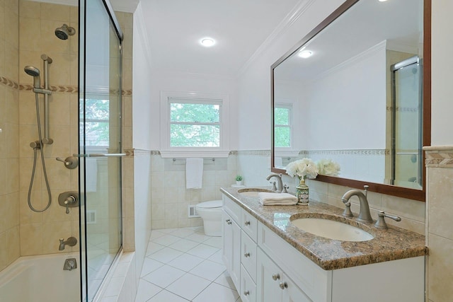 15 Old Farm Rd, Scarsdale, NY 10583 - bathroom with tile patterned flooring, crown molding, tile walls, double vanity, and toilet