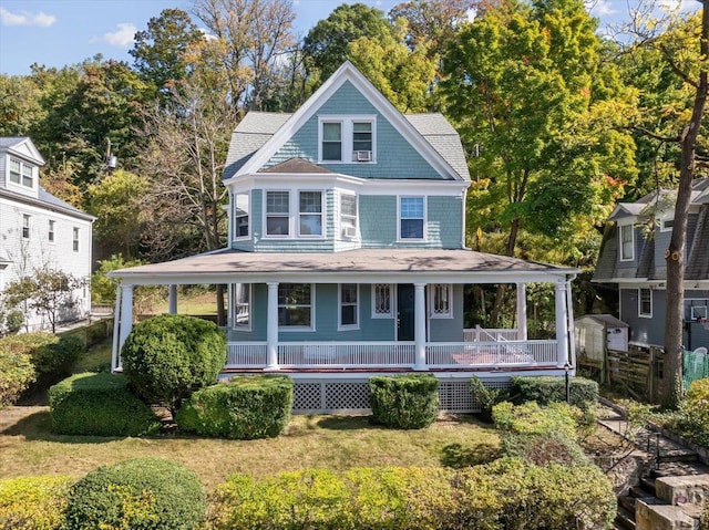 102 Broadway, Dobbs Ferry, NY 10522 - view of front of property featuring a porch and a front lawn