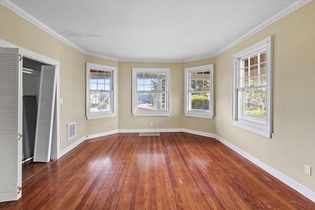 102 Broadway, Dobbs Ferry, NY 10522 - unfurnished room with wood finished floors, baseboards, and crown molding