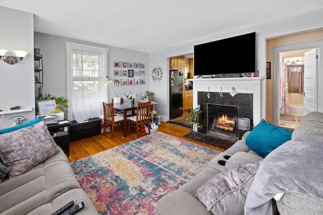 102 Broadway, Dobbs Ferry, NY 10522 - living room with wood finished floors and a tile fireplace