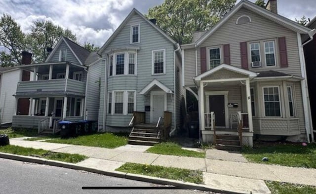 13 Hooker Ave, Poughkeepsie, NY 12601 - view of front facade featuring a chimney