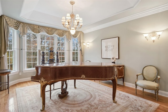 2 Shadow Tree Ln, Briarcliff Manor, NY 10510 - living area with wood finished floors, baseboards, a chandelier, crown molding, and a raised ceiling