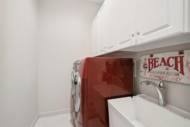 2 Shadow Tree Ln, Briarcliff Manor, NY 10510 - laundry area with cabinet space, washing machine and clothes dryer, baseboards, and light tile patterned flooring