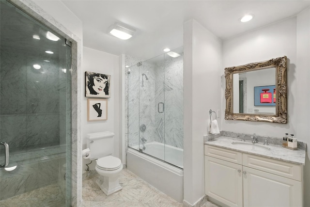 2 Shadow Tree Ln, Briarcliff Manor, NY 10510 - bathroom with toilet, vanity, combined bath / shower with glass door, and marble finish floors