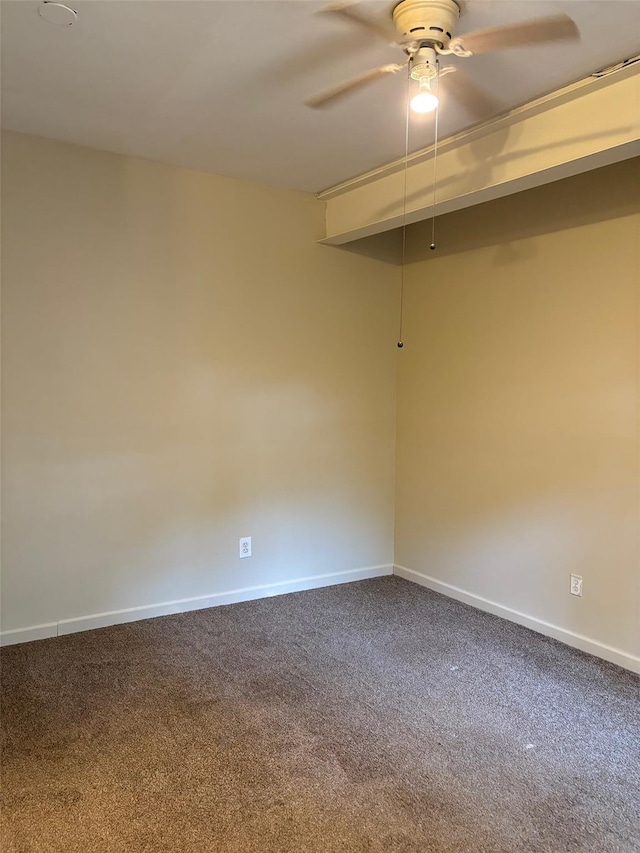 118 Truberg Ave, Patchogue, NY 11772 - empty room featuring ceiling fan, dark carpet, and baseboards
