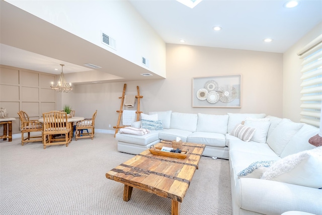 36 Randy Ln, Plainview, NY 11803 - carpeted living area featuring a chandelier, recessed lighting, and baseboards