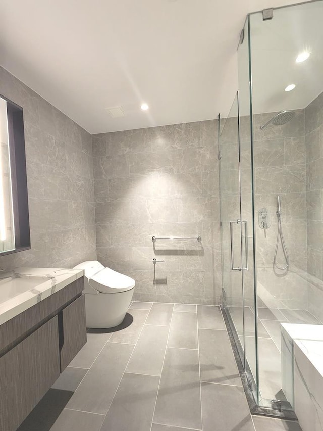 133-36 37th Ave Unit 8B, Flushing, NY 11354 - full bath with vanity, tile walls, a stall shower, toilet, and recessed lighting