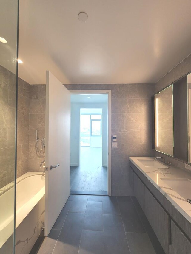 133-36 37th Ave Unit 8B, Flushing, NY 11354 - full bath with tile patterned flooring and double vanity