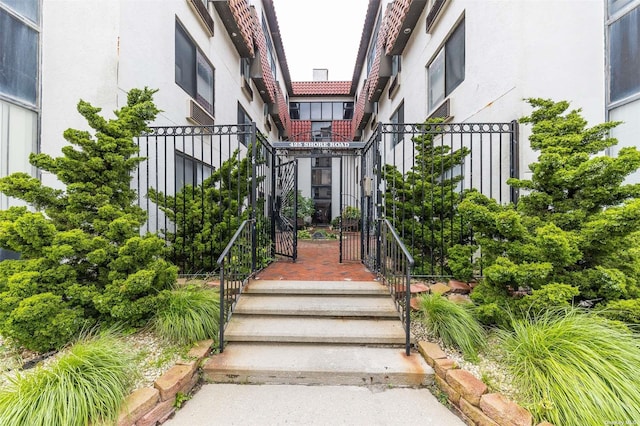 425 Shore Rd Unit 2B, Long Beach, NY 11561 - property entrance with stucco siding
