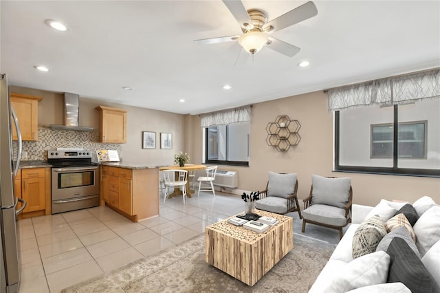 425 Shore Rd Unit 2B, Long Beach, NY 11561 - living area with light tile patterned floors, ceiling fan, recessed lighting, and a wall unit AC