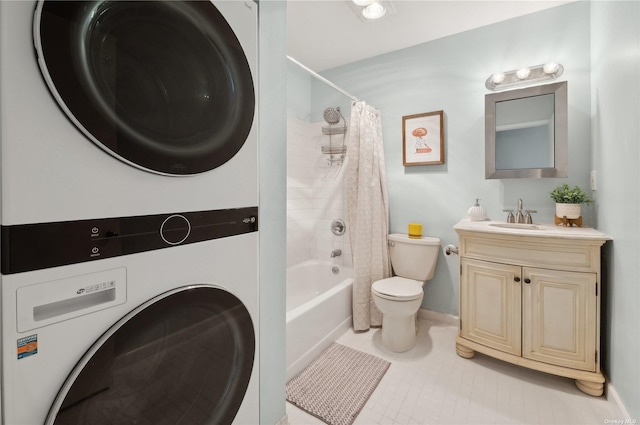425 Shore Rd Unit 2B, Long Beach, NY 11561 - bathroom featuring stacked washing machine and dryer, toilet, shower / tub combo, vanity, and tile patterned floors