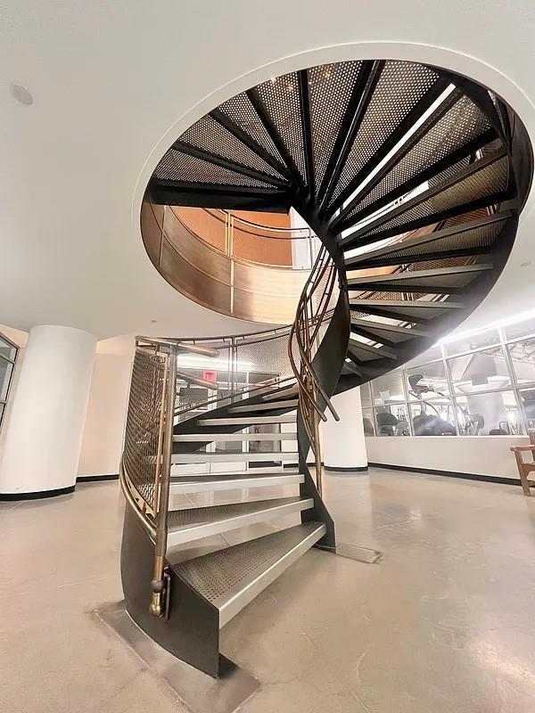 2728 Thomson Ave Unit 434, Long Island City, NY 11101 - stairway featuring finished concrete flooring