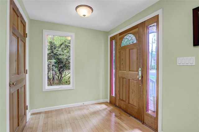 23 Knox Ave, Stony Brook, NY 11790 - entryway with light wood-style floors and baseboards