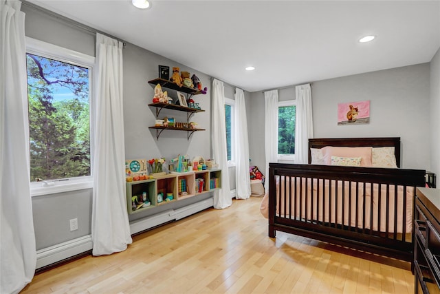 23 Knox Ave, Stony Brook, NY 11790 - bedroom with light wood-type flooring and recessed lighting