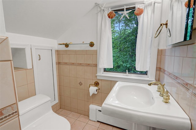 23 Knox Ave, Stony Brook, NY 11790 - bathroom with tile walls, toilet, and tile patterned floors