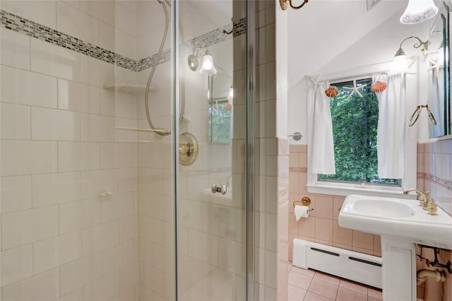 23 Knox Ave, Stony Brook, NY 11790 - bathroom featuring a baseboard radiator, a stall shower, and tile walls