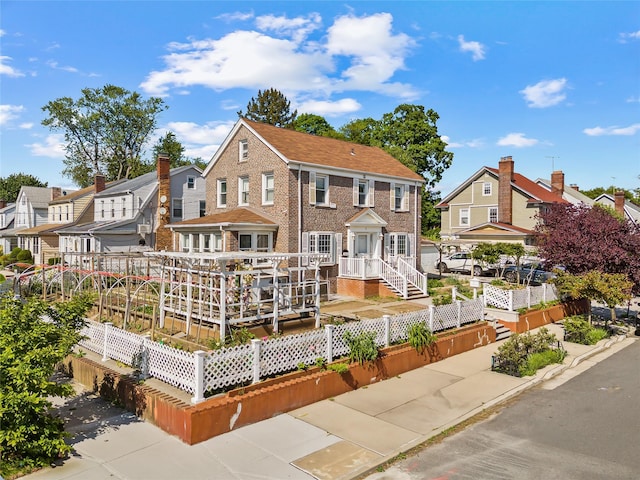 17103 45th Ave, Flushing, NY 11358 - rear view of property with a residential view and a wooden deck