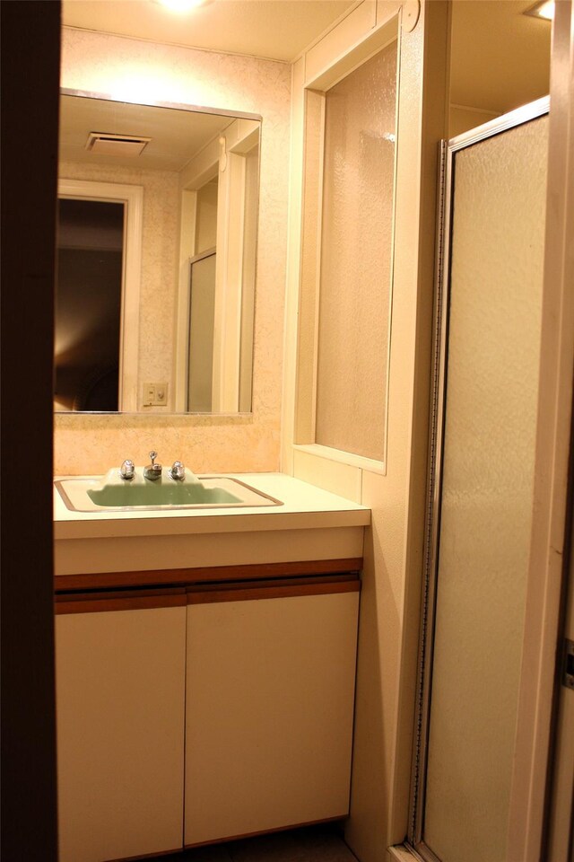 113 Pine Neck Ave, East Patchogue, NY 11772 - bathroom featuring vanity and a stall shower
