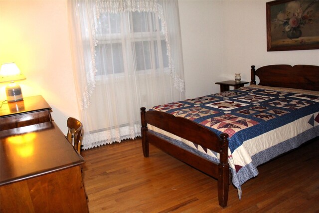 113 Pine Neck Ave, East Patchogue, NY 11772 - bedroom with wood finished floors
