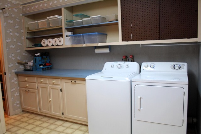 113 Pine Neck Ave, East Patchogue, NY 11772 - washroom featuring separate washer and dryer and cabinet space
