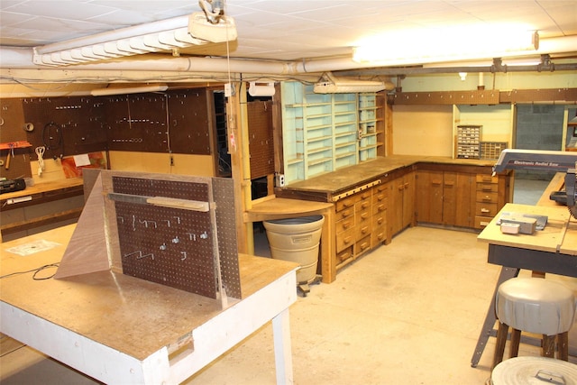 113 Pine Neck Ave, East Patchogue, NY 11772 - unfinished below grade area with a workshop area