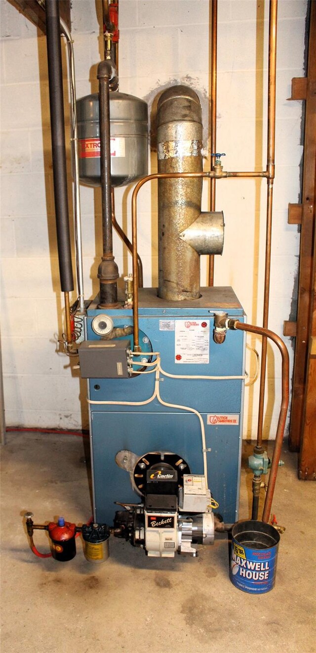 113 Pine Neck Ave, East Patchogue, NY 11772 - utilities featuring a heating unit