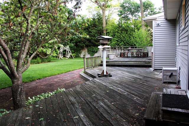 113 Pine Neck Ave, East Patchogue, NY 11772 - deck featuring a lawn