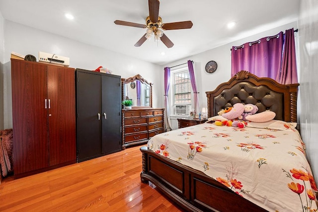 34-15 91st St, Jackson Heights, NY 11372 - bedroom featuring light wood-style flooring, a ceiling fan, and cooling unit