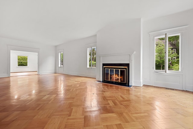 158 Loring Ave, Pelham, NY 10803 - unfurnished living room with a glass covered fireplace and baseboards