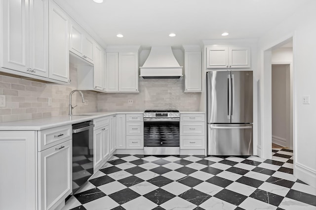 158 Loring Ave, Pelham, NY 10803 - kitchen featuring appliances with stainless steel finishes, custom range hood, dark flooring, light countertops, and a sink