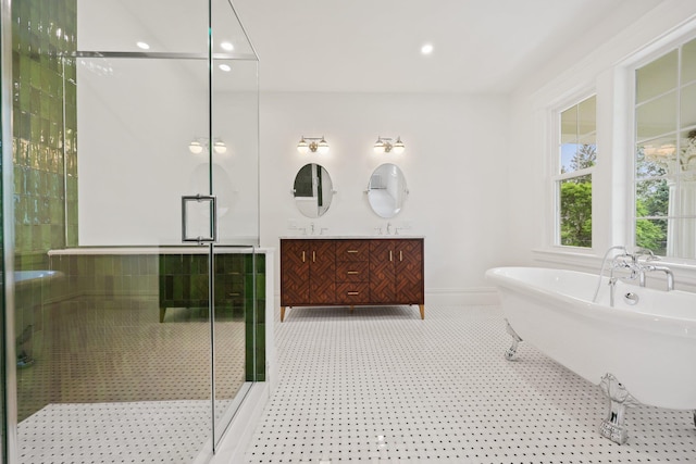 158 Loring Ave, Pelham, NY 10803 - full bathroom featuring a shower stall, a freestanding tub, double vanity, recessed lighting, and baseboards