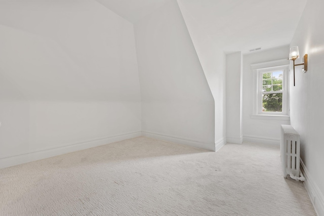 158 Loring Ave, Pelham, NY 10803 - additional living space with radiator heating unit, light colored carpet, and baseboards