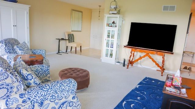 200 High Point Dr Unit 302, Hartsdale, NY 10530 - carpeted living area with baseboards
