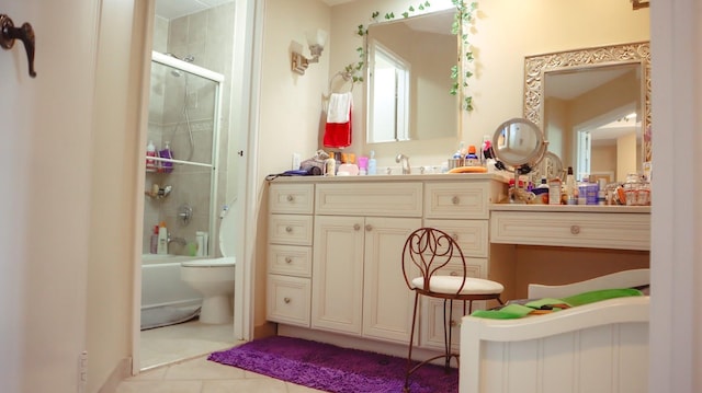 200 High Point Dr Unit 302, Hartsdale, NY 10530 - full bathroom featuring vanity, shower / bath combination with glass door, toilet, and tile patterned flooring