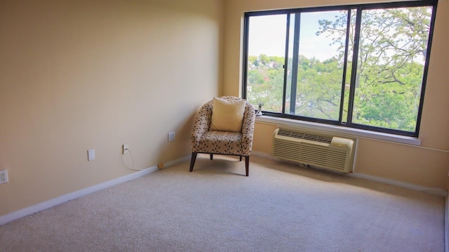 200 High Point Dr Unit 302, Hartsdale, NY 10530 - sitting room featuring a wall mounted AC, plenty of natural light, carpet flooring, and baseboards