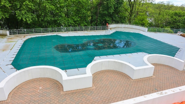 200 High Point Dr Unit 302, Hartsdale, NY 10530 - view of swimming pool with a forest view