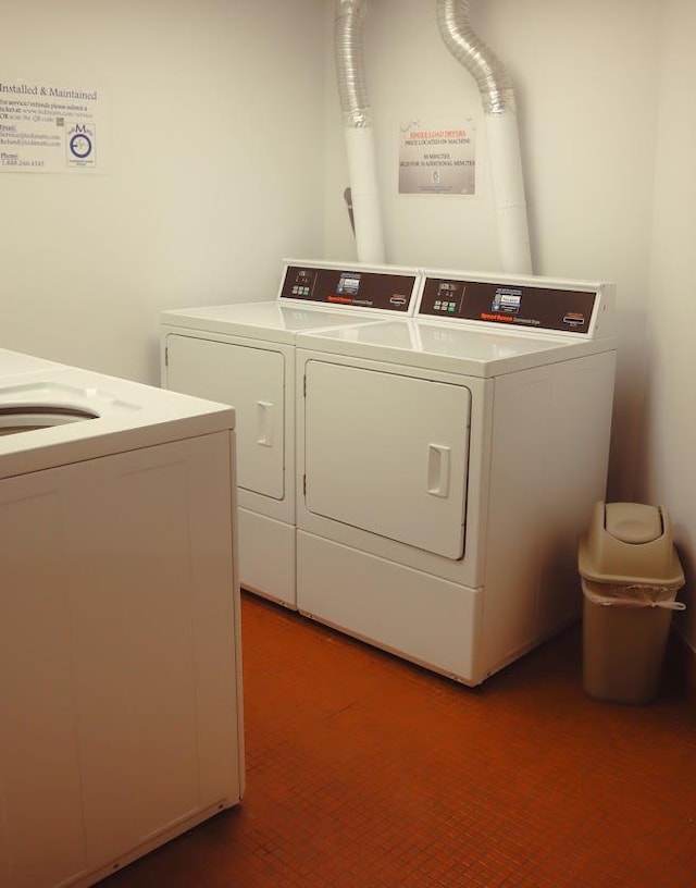 200 High Point Dr Unit 302, Hartsdale, NY 10530 - communal laundry room with washing machine and clothes dryer