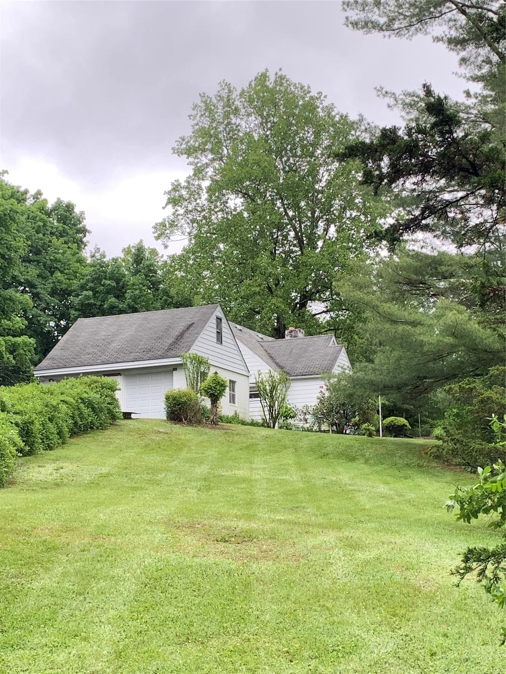 48 Sedgewick Rd, Poughkeepsie, NY 12603 - view of grassy yard with a garage