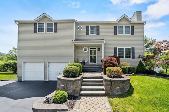 7 Pilgrim Ln, Washingtonville, NY 10992 - view of front of property featuring a chimney, asphalt driveway, an attached garage, and a front lawn