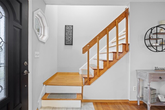 7 Pilgrim Ln, Washingtonville, NY 10992 - entryway featuring wood finished floors, baseboards, and stairs